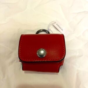Coach ear bud case cover in the color red